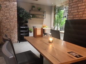 Downstairs, entrance to other shops at Holy Cow in Bergen