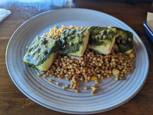 Lemon caper Tofu over couscous. So delicious at Sia's in Pittsburgh