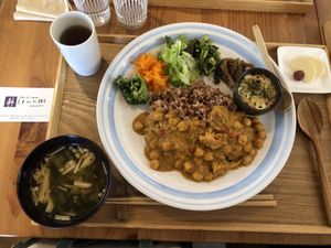 I had chickpea curry with daikon pickles, mustard leaves in mustard dressing, gratin made from yams, kimpira, and broccoli in peanut sauce ❤️  at Hannoki in Kiryu