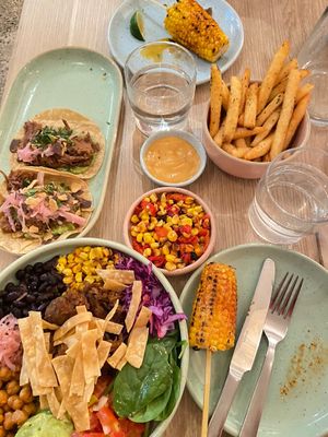 Chargrilled corn cobs, fries and the Mex Bim Bap with mushroom and side of corn salsa!! (Tacos are not mine and not vegan but they have Fable Mushroom option!)  at Fonda in Surry Hills