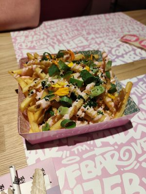 Fríes with garlic sauce at Vegan Junk Food Bar -  L'Eixample in Barcelona