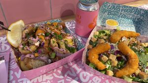 Salad, vegan fish and hibiscus soda  at Vegan Junk Food Bar -  L'Eixample in Barcelona