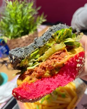 VJFB Cruelty Free Burger: "beeef" on a black/pink bun, cheeze, lettuce, tomato, pickles, VJFB sauce at Vegan Junk Food Bar -  L'Eixample in Barcelona