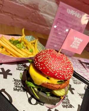 VJFB Cruelty Free Burger: "beeef" on a black/pink bun, cheeze, lettuce, tomato, pickles, VJFB sauce at Vegan Junk Food Bar -  L'Eixample in Barcelona