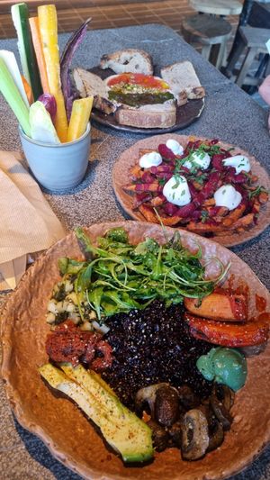 Bowl, sweet potato fries a d hummus with veg at Honest Greens - Barceloneta in Barcelona