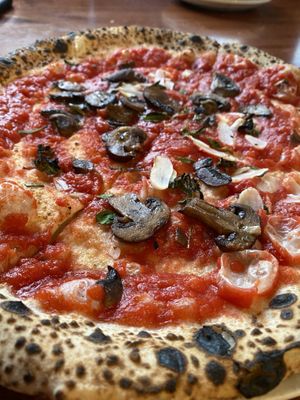 Vegan pizza with mushrooms  at Pizzicletta - Pheonix in Flagstaff