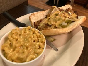 Philly cheesesteak with a side of mac 'n' cheese at The Chicago Diner - Logan Square in Chicago