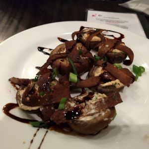 Seitan bacon wrapped stuffed mushrooms. at The Chicago Diner - Logan Square in Chicago
