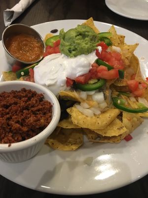 Vegan nachos with soy chorizo and non-dairy sour cream at The Chicago Diner - Logan Square in Chicago