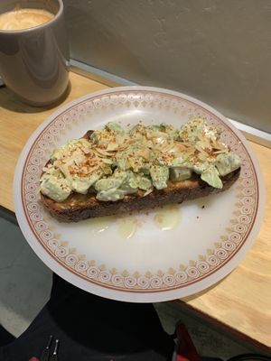 Café de avena y tostadas aguacate   at Dale Café  in Madrid