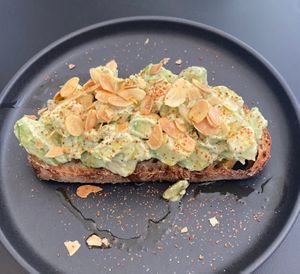 Avo/tahini/almond toast at Dale Café  in Madrid