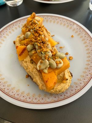 Vegan toast with Cashew spread, sweet potato, edamame and cashew dukkah ❤️ at Dale Café  in Madrid