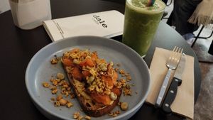 Cashew cheese, roasted squash, and broad been toast (to DIE for) + green smoothie at Dale Café  in Madrid