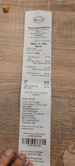 Extra charges on receipt at Honest Indian Restaurant in Wilmington