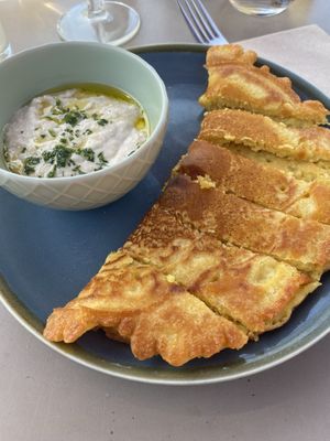 Chickpea socca with rosemary and garlic bean purée  at The Lost Kitchen in Tiverton