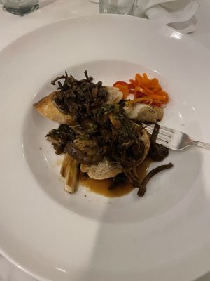 Braised mushroom and collard greens over baguette  at Commander's Palace in New Orleans