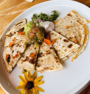 Quesadilla…delightful, flavorful. I always love flowers on my plate!  at Hi Flora! in Minneapolis