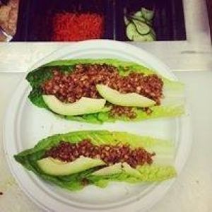 Raw vegan/GF Fiesta taco (made from walnuts and spices) served on a romaine leaf with avocado. Usually comes with tomatoes and salsa on top.  at Superfoods Cafe & Market in Mt Airy