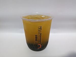 Mango fruit tea with blueberry boba. at Shaka Bubble Tea in Llandudno