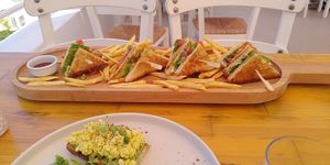 Club Sandwich (top) and rest of Avocado Toast (bottom) at T Veg  in Rhodes