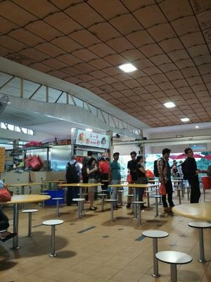 near centre of Hawker Centre which is next to bus interchange  at Hong Yi Vegetarian 弘一斋 in Central Singapore