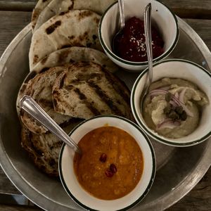 Three Dips and Bread: Muhammara, Prasani Fava, Roasted Beet  at Bar Neon in Toronto