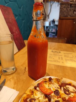 Homemade hot sauce at  夏太熱 Summer Too Hot Pizzatopia in Hualien
