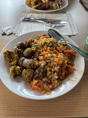 Veggie balls with a quinoa mix and a tomato & spinach ragout  at IKEA - Greenwich in South East London