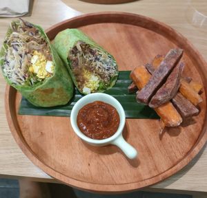 Scrambled Tofu Wrap with Sweet Potato Fries at Sauce Tree Sanur: Plant Based Cafe in Sanur