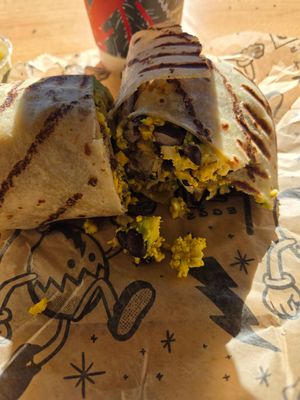 Happy Cow Burrito on a gluten-free wrap. Added black beans. at Rise Up Coffee in Cambridge