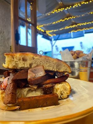Homemade Focaccia with vegan lomo saltado based in seitan at Lounge del Brujo Centro Histórico in Arequipa
