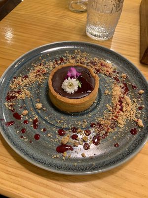 Red fruit and chocolate tart   at Lounge del Brujo Centro Histórico in Arequipa