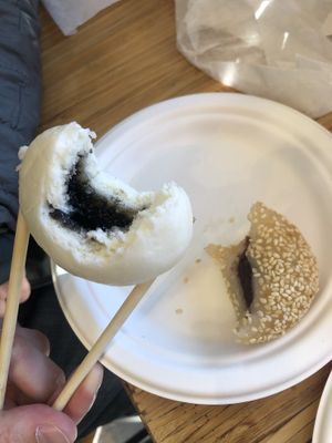 Black sesame bao and red bean ball  at Kam Wai Dim Sum in Vancouver