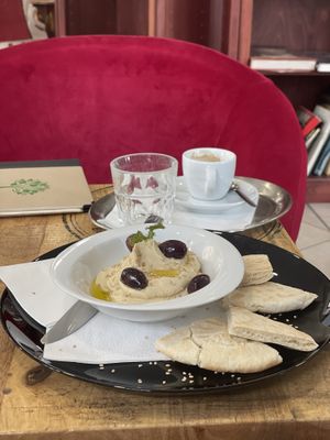 Hummus with olives and pita breadd  at Vox Libri in Vienna