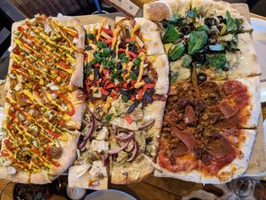 Vegan pizza flight (westerdog is the best!) at The Mitten Brewing Co in Grand Rapids