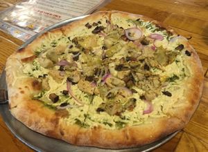 Vegan 'chicken' pesto pizza at The Mitten Brewing Co in Grand Rapids