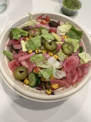 Amazing bowl with basmati rice, black lentils, falafel, and many different fresh, roasted, and pickled veggies. Humus and sauces are amazing    at CAVA in Georgetown