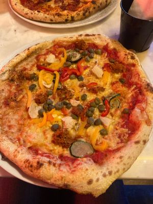 Vegan pizza with Tuscan sausage, artichoke, courgette, red pepper and capers.  at Pizza Punks in Nottingham