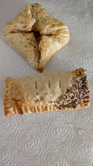 Pizza Puff and sausage and just vgg hand pie. at Valhalla Bakery in Orlando