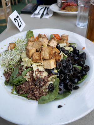 Spitball spinach salad with tofu  at The Natural Cafe - State St in Santa Barbara