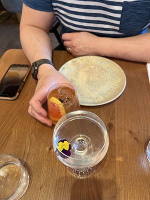 Cocktails - a coffee one (the orange one) and Genmaicha martini   at Mallow - Canary Wharf in East London