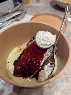 Chocolate cake with pistachio anglaise at Mallow - Canary Wharf in East London