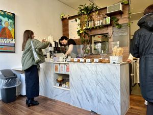 Counter view from one of two window tables   at TheDorkyFrench Vegan Bakery in Glasgow
