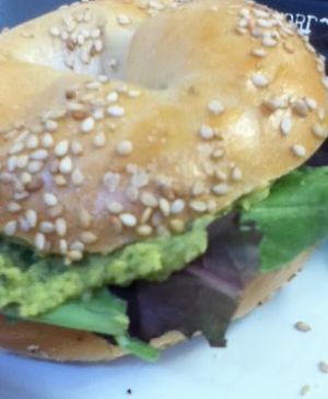 Lime Cilantro Hummus with greens on a Sesame Bagel. at Webster's Cafe in State College