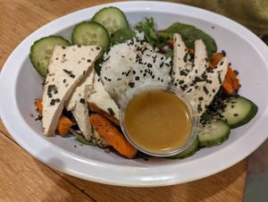 Tofu rice dish that was wonderful! Dressing on the side for the little one. at Webster's Cafe in State College