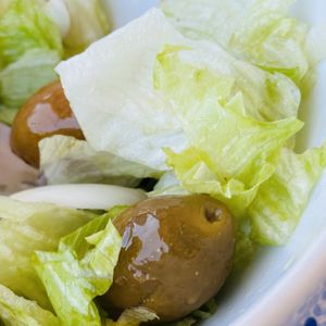 Lettuce salad with onions and olives   at T' Agnantio in Nikitas