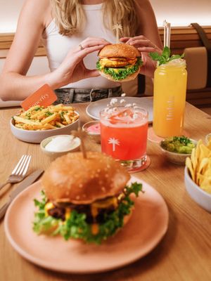 Dinner for three: Me, Myself and I.

Plant-based burger, Superfries, Snacks and handcrafted cocktails and Hulala in Düsseldorf. at Hulala in Dusseldorf