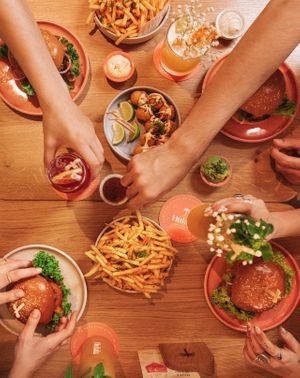 Sharing Burger Moments at Hulala with plant-based Burger, Superfries, Cocktails and Cheezeballs at Hulala in Dusseldorf