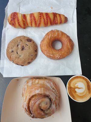 Pretzel dog $7.90, Chocolate walnut cookie $5.80, Vanilla glazed bronut $6.50, Apple caramel bun $6.50 at Mister Nice Guy's Bakeshop in Ascot Vale