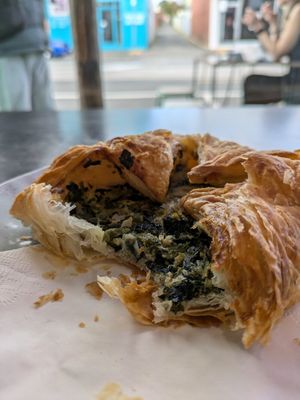 Spinach and fetta triangles at Mister Nice Guy's Bakeshop in Ascot Vale